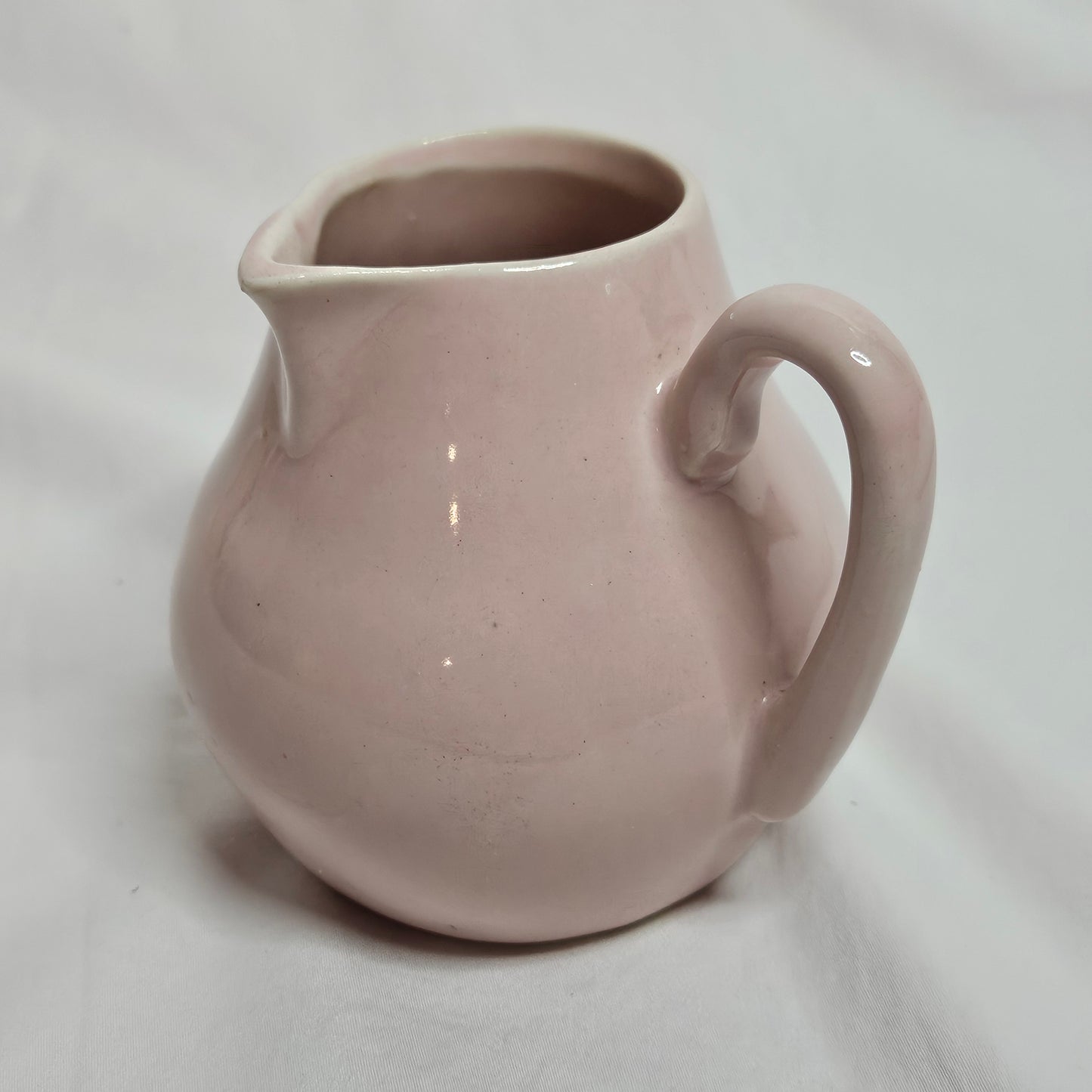 Niloak small creamer pitcher, light pink, 4 inches tall