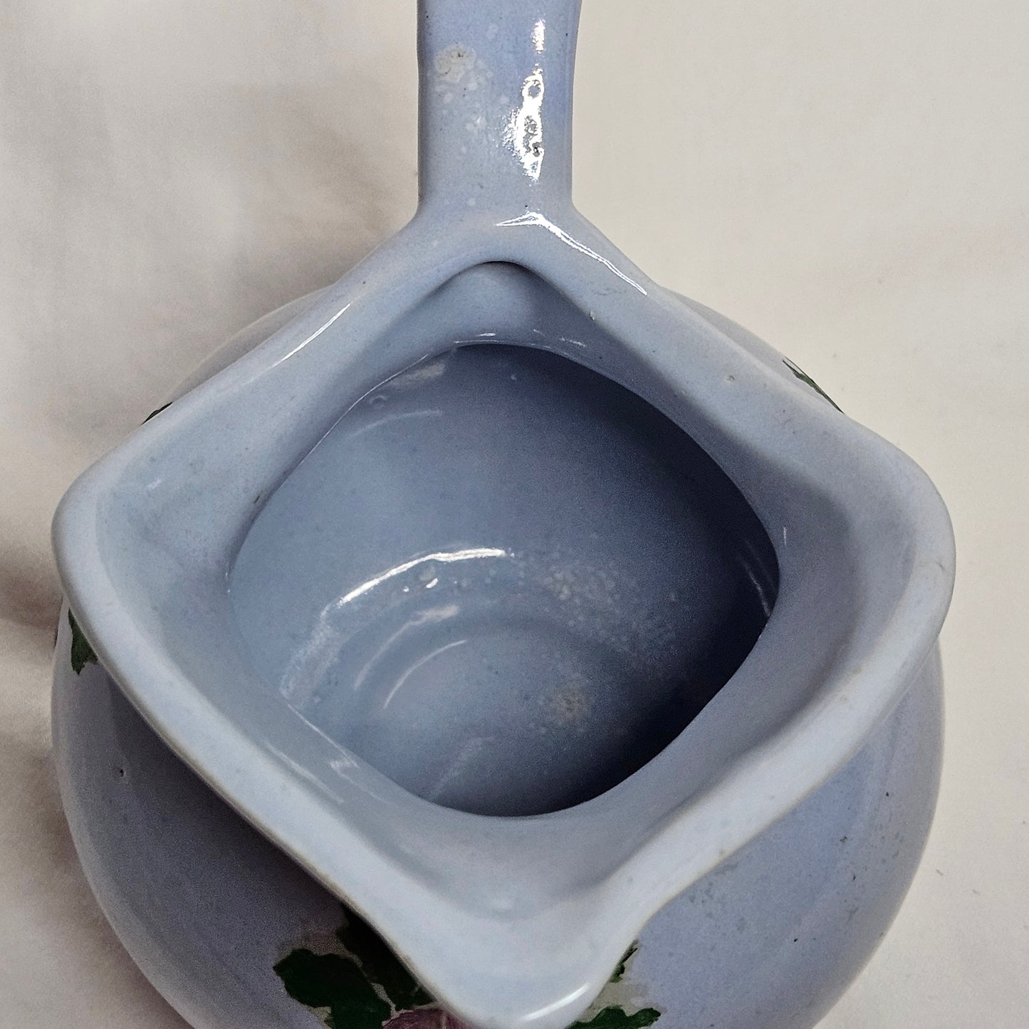 Vintage Niloak Pottery small light blue pitcher with hand-painted grape clusters