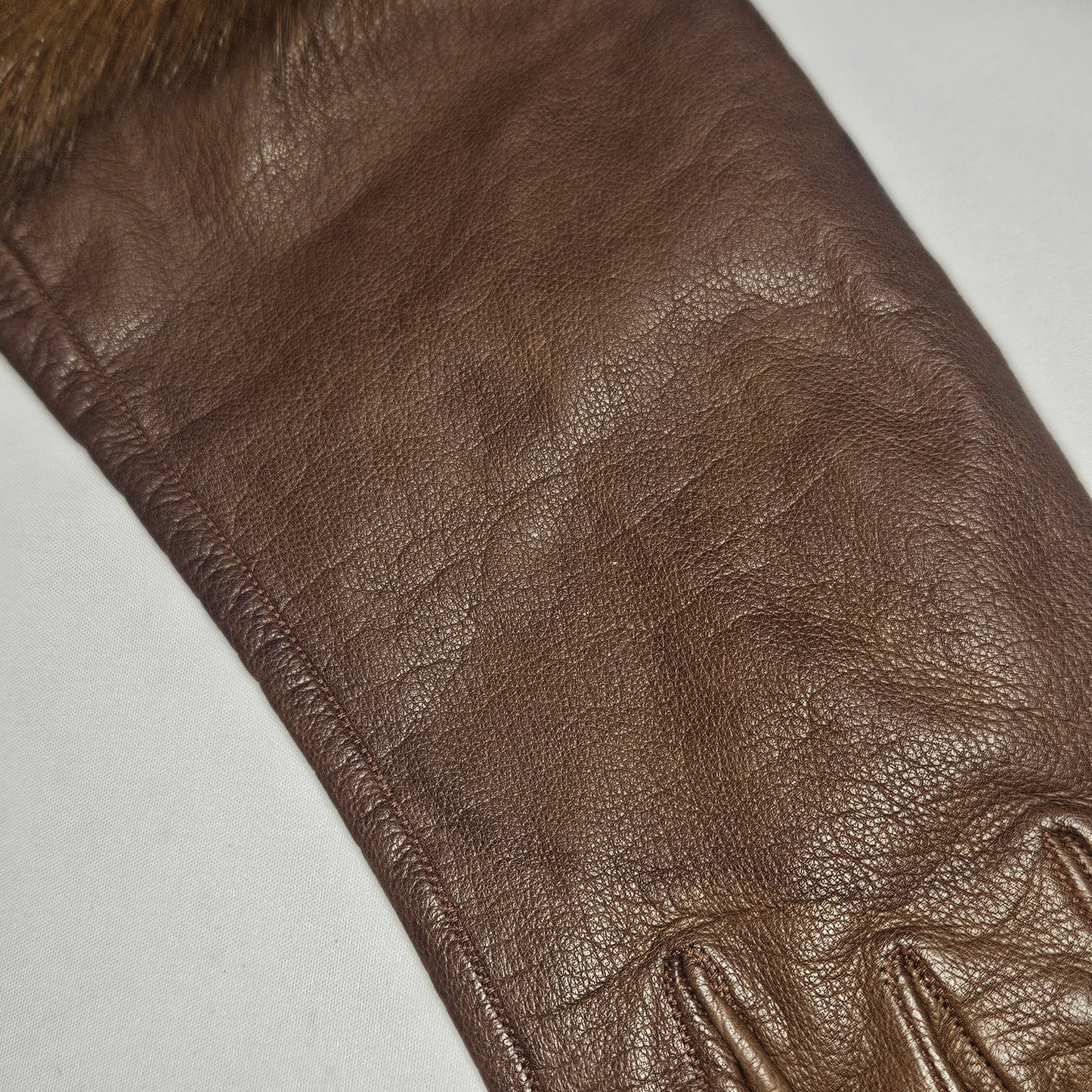 Vintage women's fur trimmed brown leather gloves