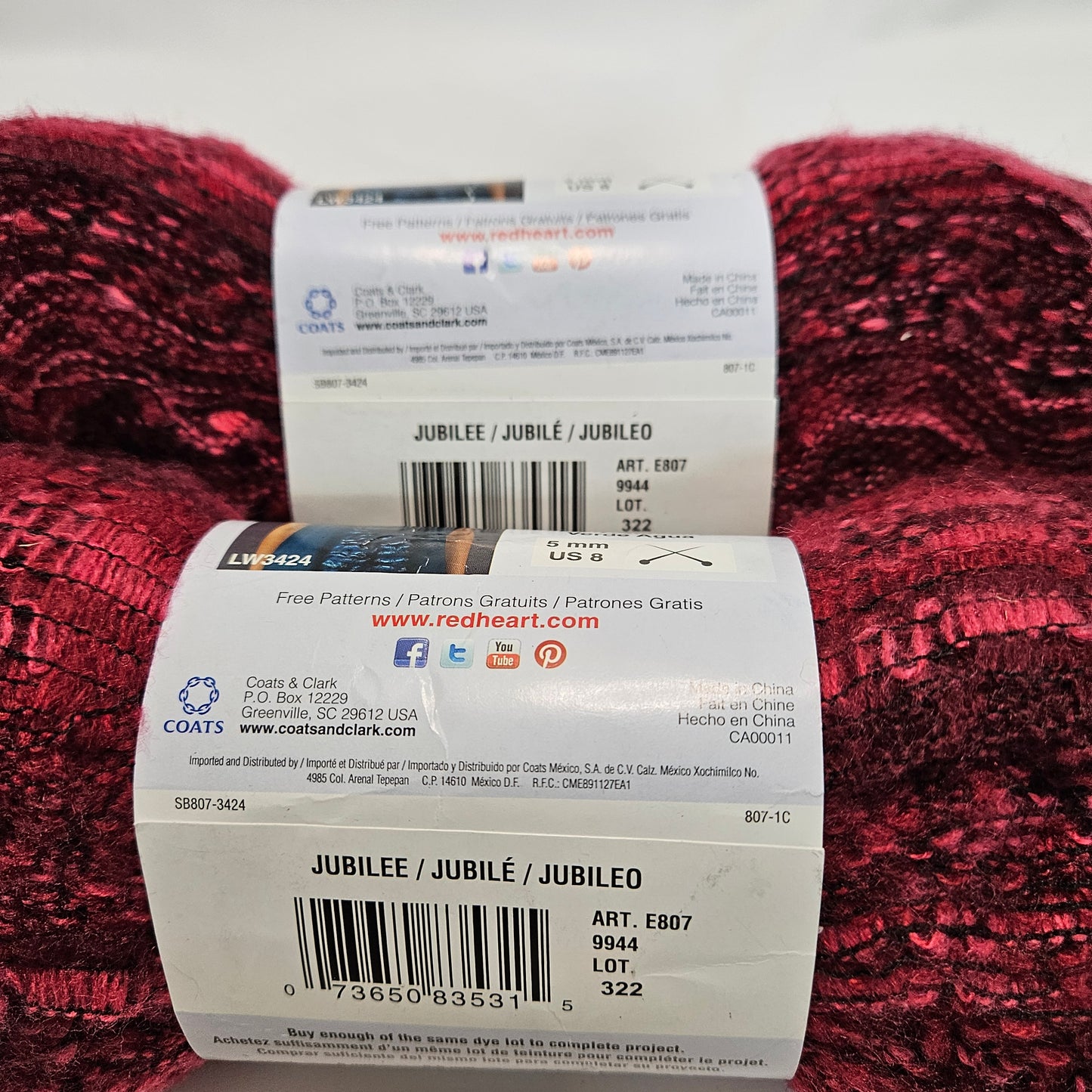 Red Heart Filigree super bulky yarn, color Jubilee 2 skeins