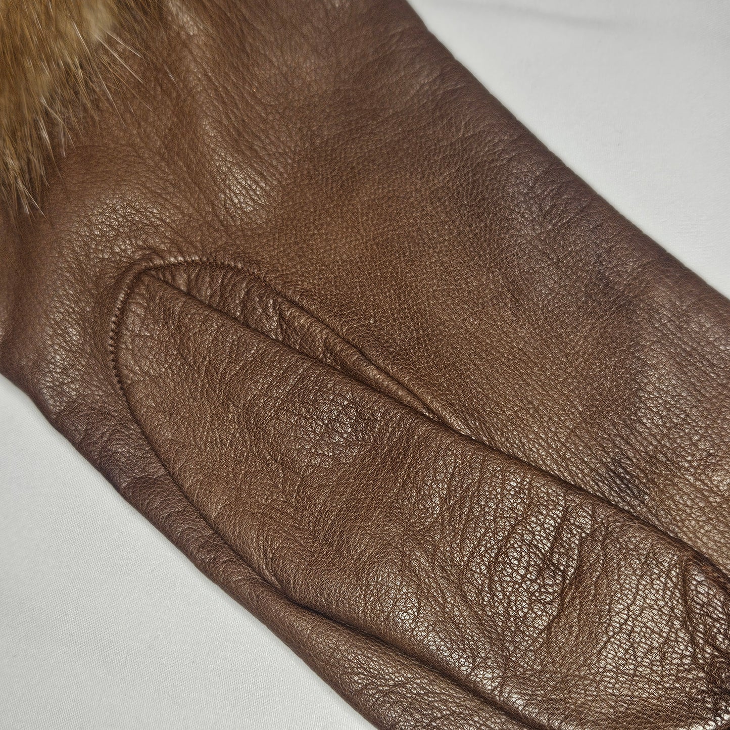 Vintage women's fur trimmed brown leather gloves