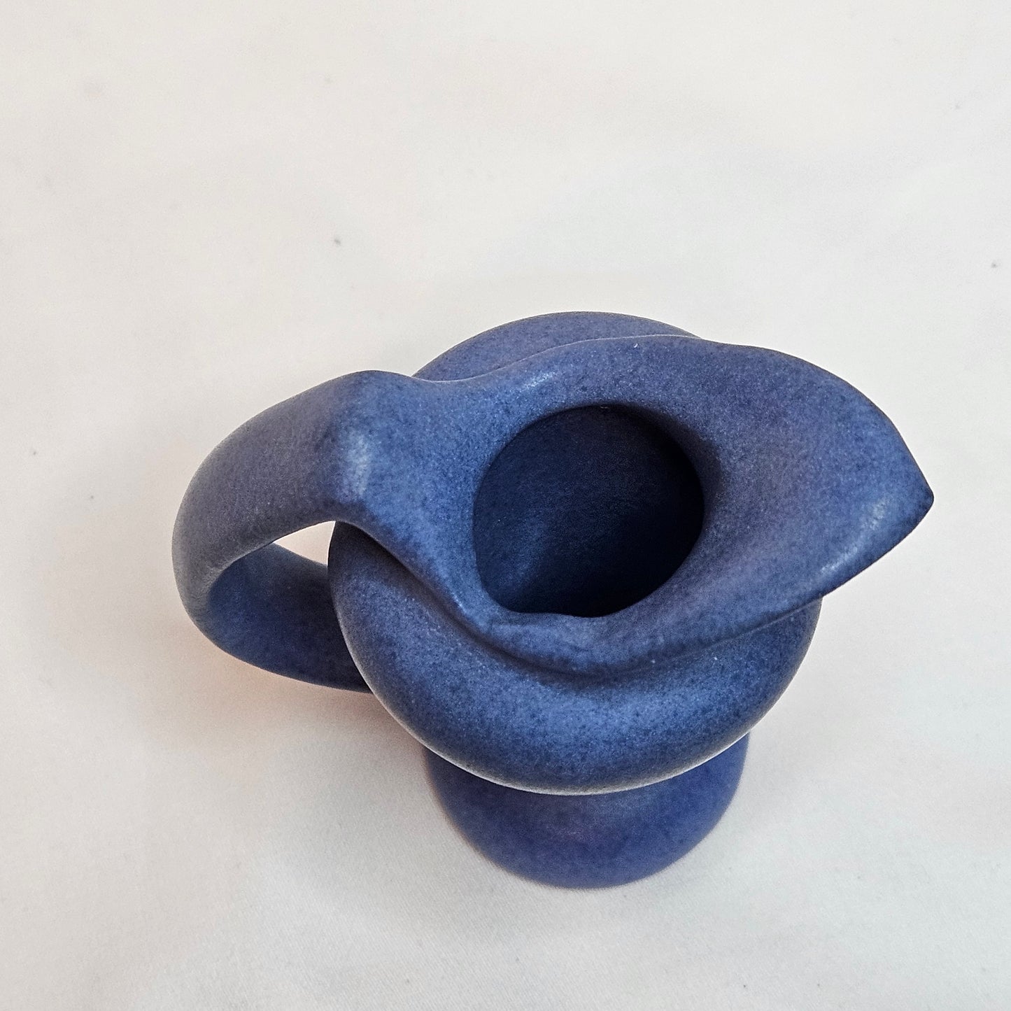 Vintage Niloak Pottery miniature pitchers, 3.25 inches tall