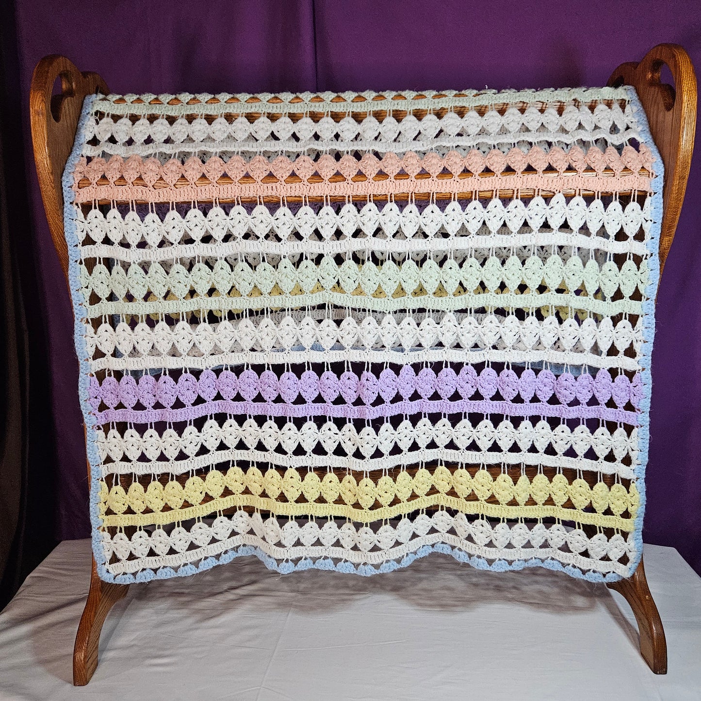 43" x 34" lacy crocheted decorative blanket in pastel colors