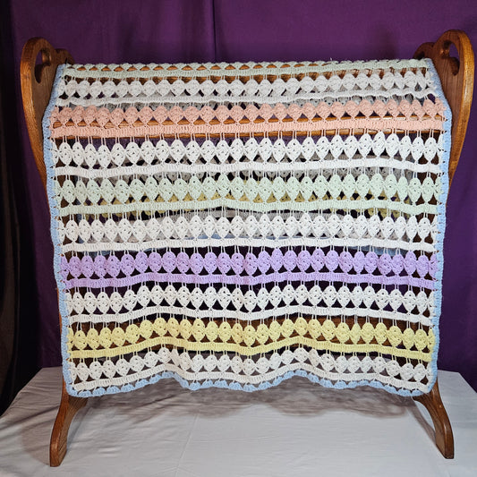 43" x 34" lacy crocheted decorative blanket in pastel colors