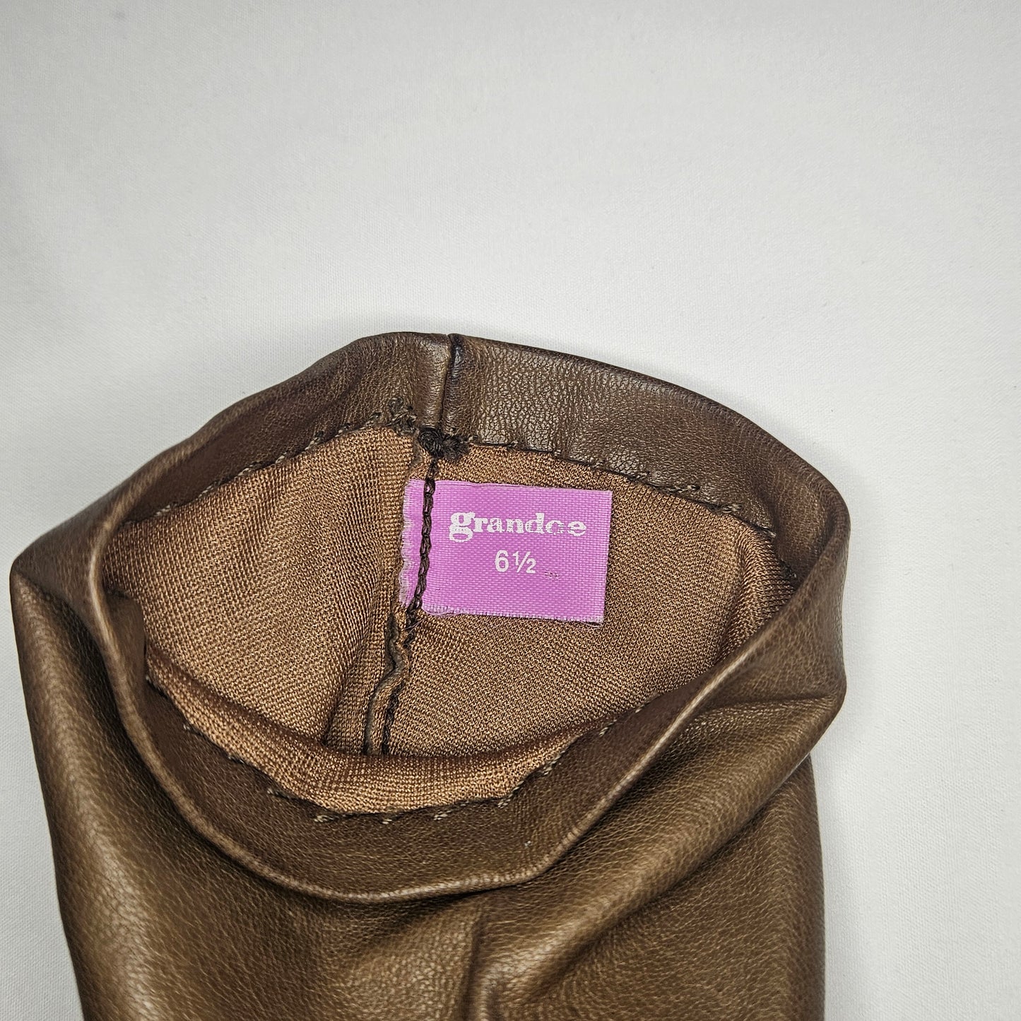 Vintage women's brown leather gloves by Grandoe, size 6.5, silk lined