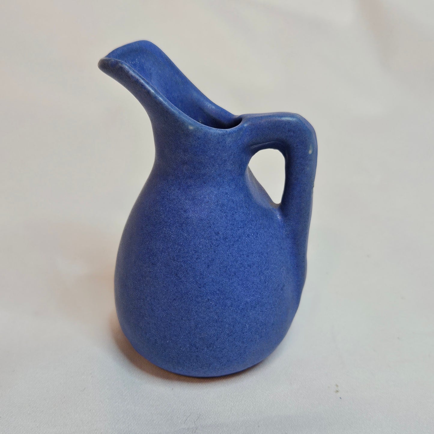 Vintage Niloak Pottery miniature pitchers, 3.25 inches tall