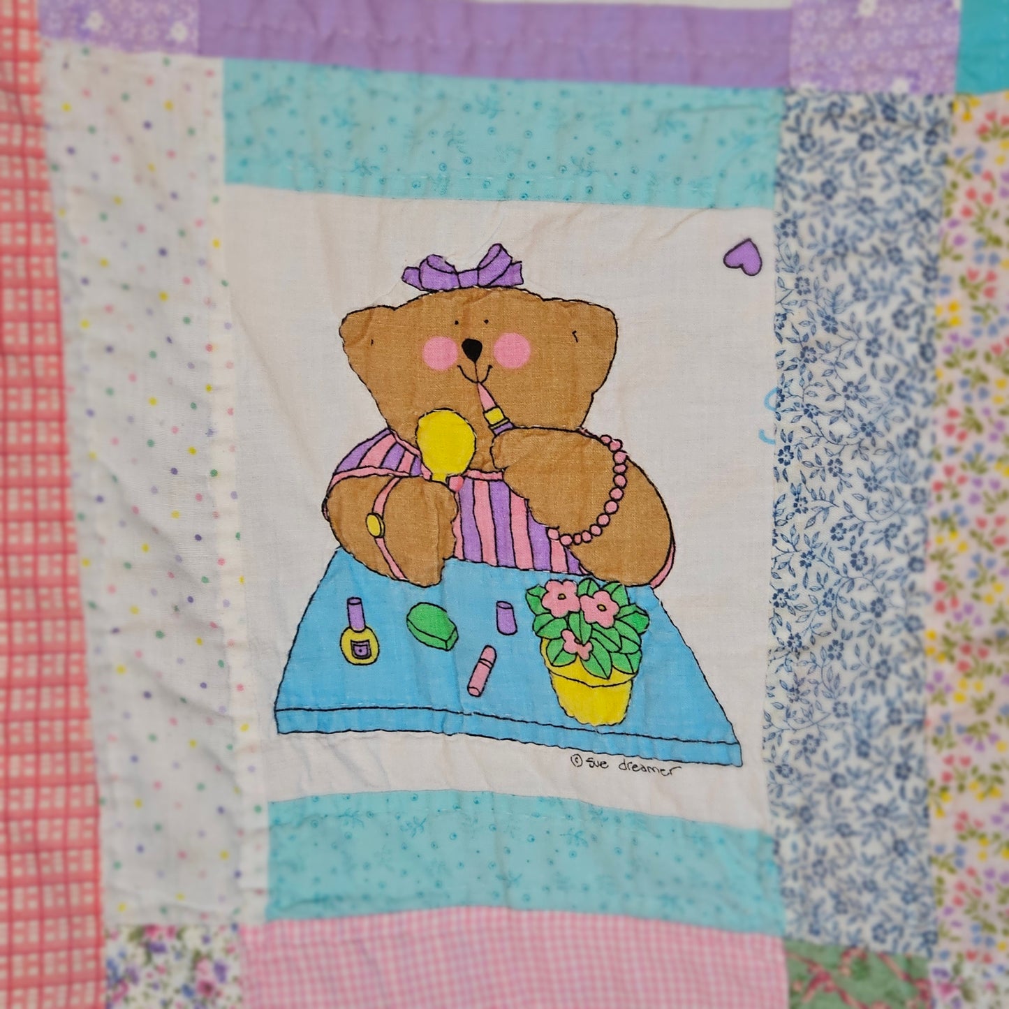 Vintage hand-quilted Sue Dreamer bear quilt, 66 x 58 inches