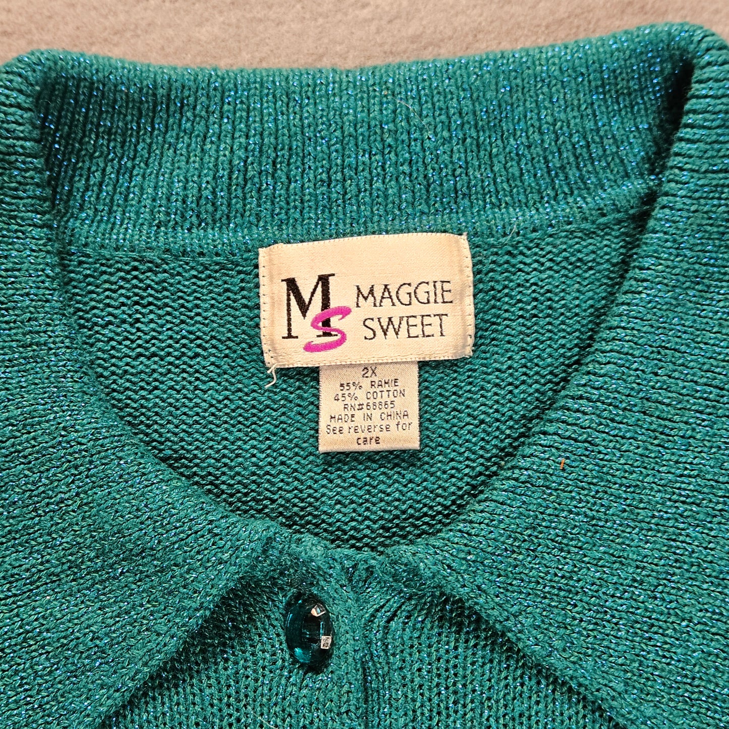 Maggie Sweet long-sleeve sweater with button-up collar, metallic thread accents