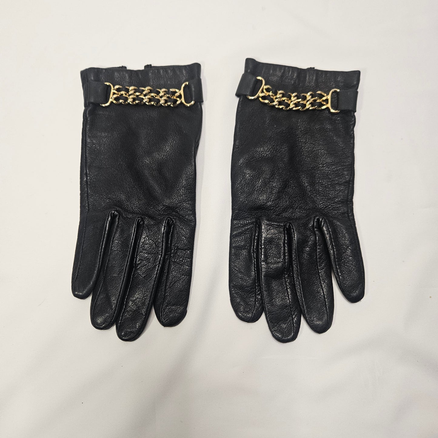 Womens vintage Agnelle black lamb leather silk lined gloves with gold chain accent