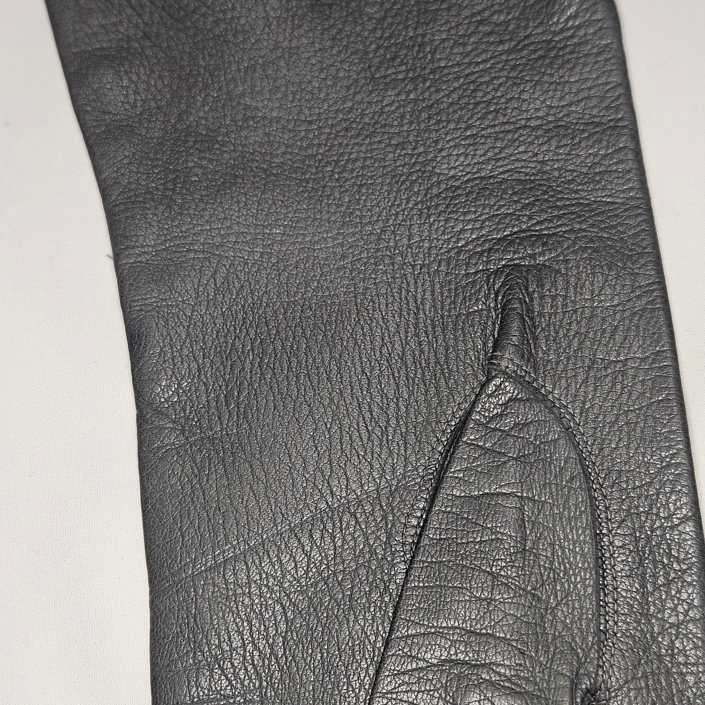 Vintage women's long grey leather unlined gloves. Made in Italy for Macy Associates.