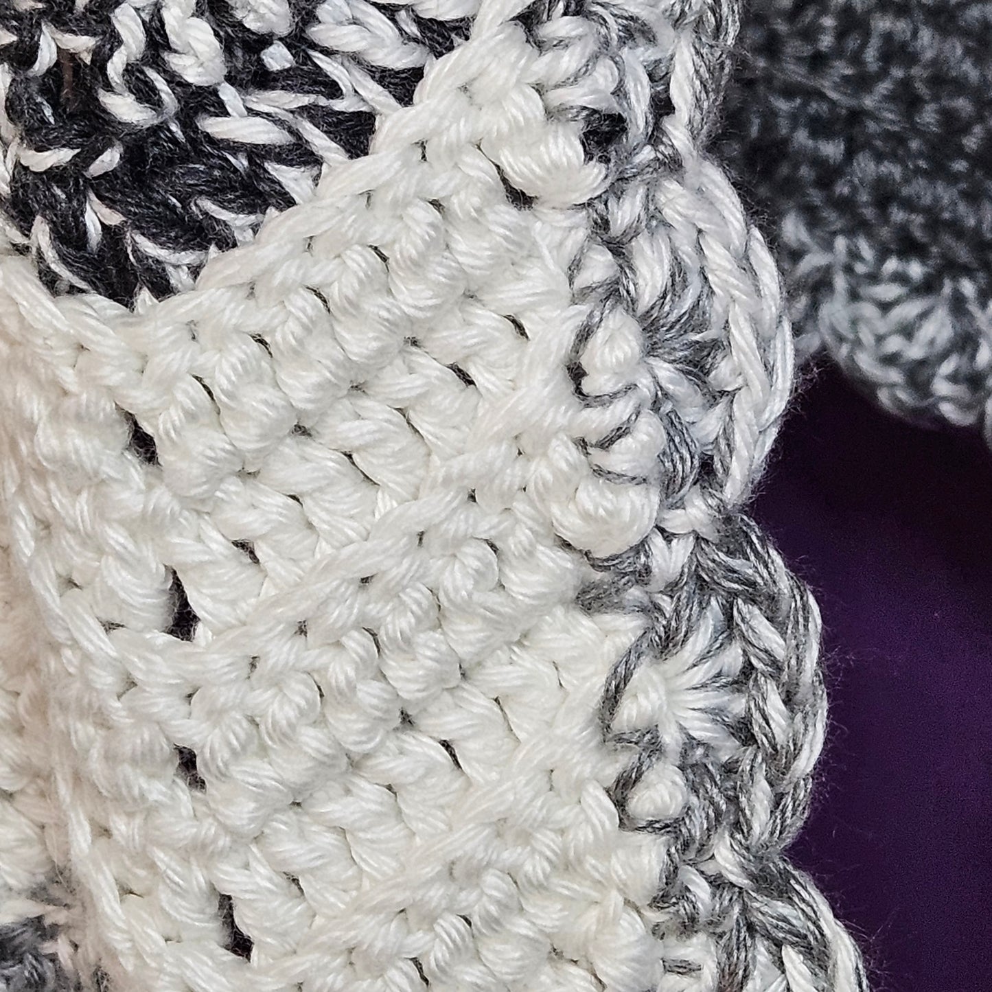 Handmade crochet heavy blanket in black, white, and grey, 45" x 39"