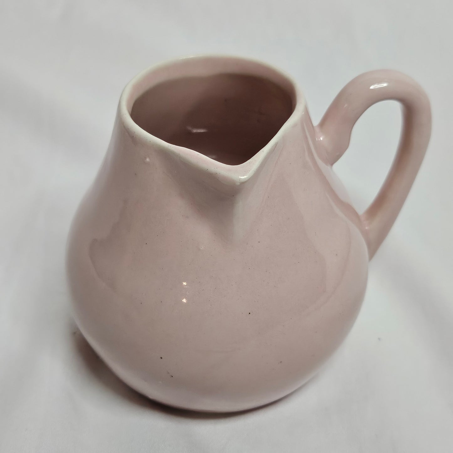 Niloak small creamer pitcher, light pink, 4 inches tall