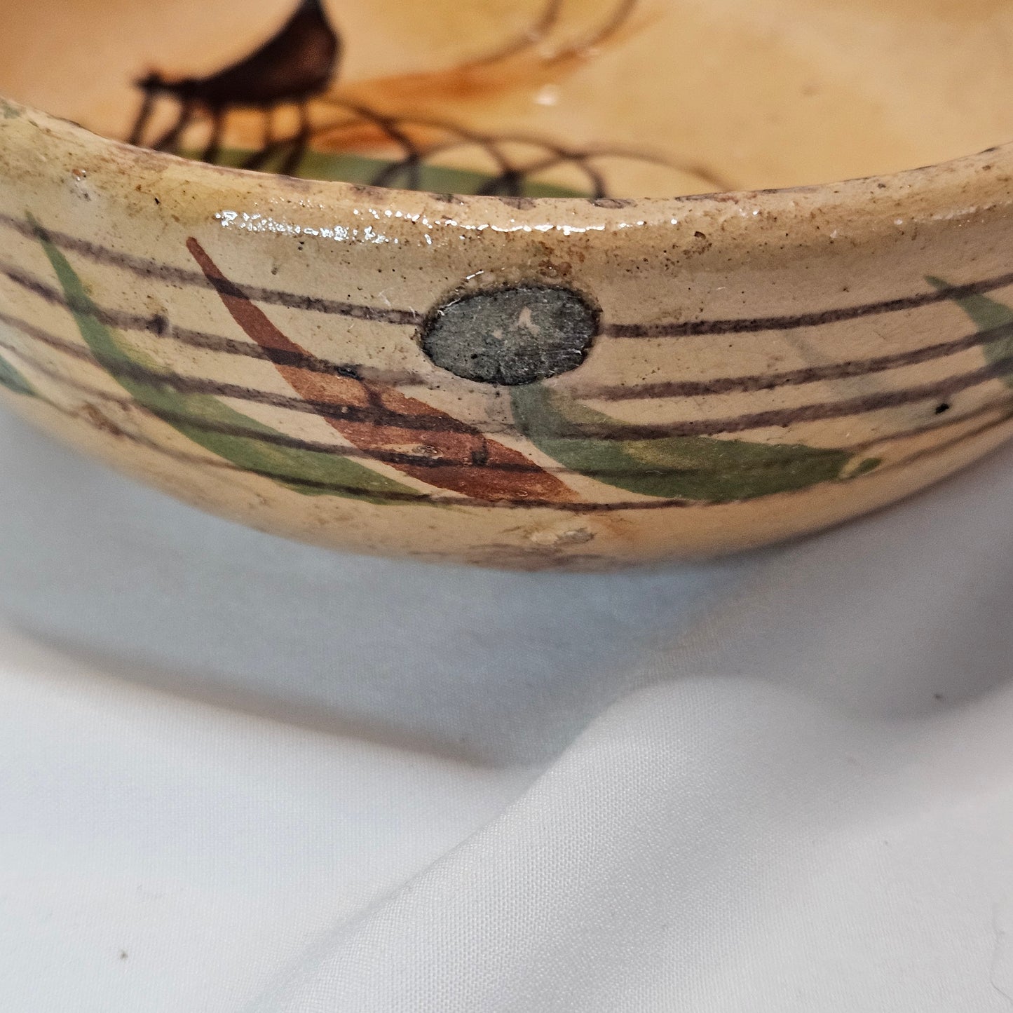 Vintage Mexican primitive clay bowl with handle