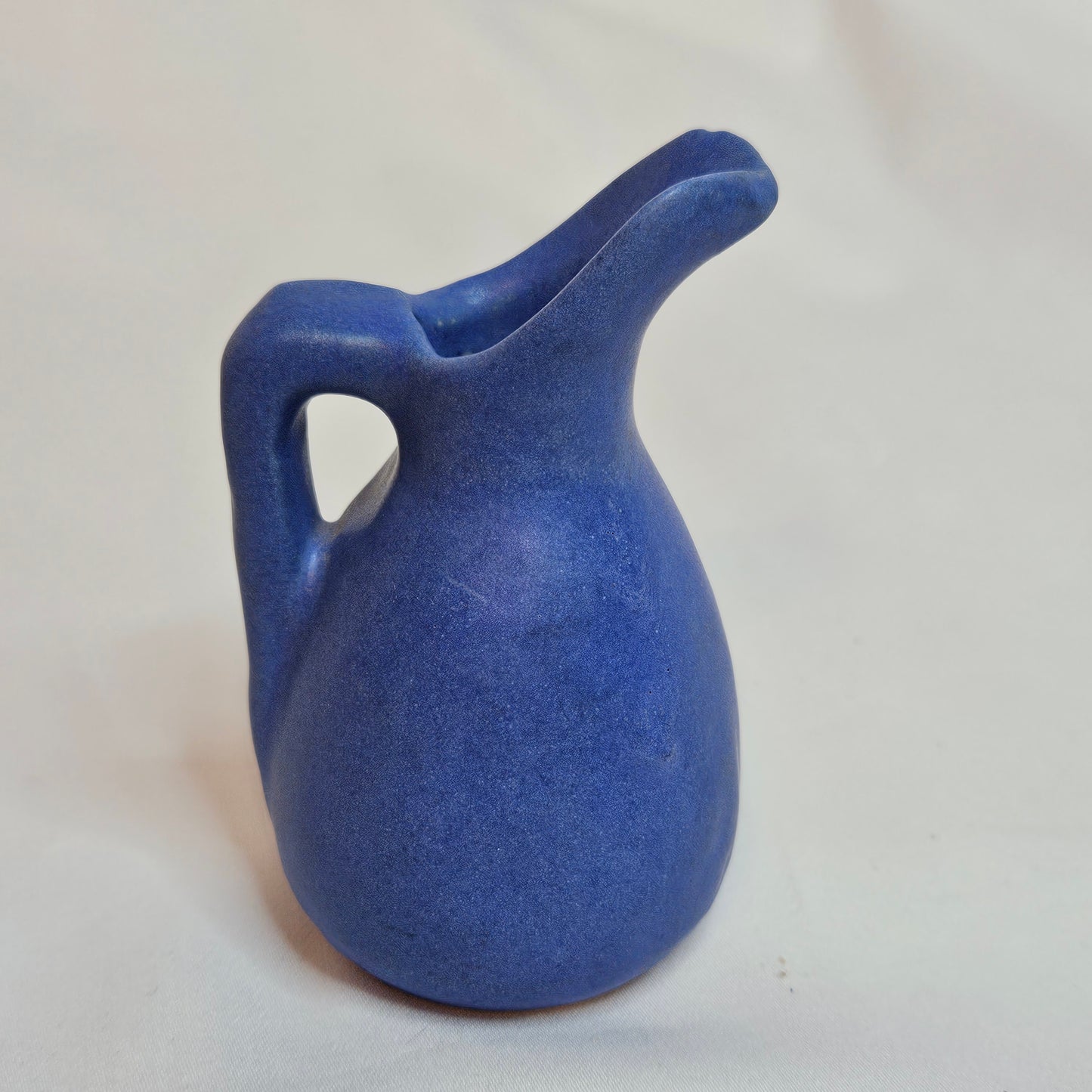 Vintage Niloak Pottery miniature pitchers, 3.25 inches tall