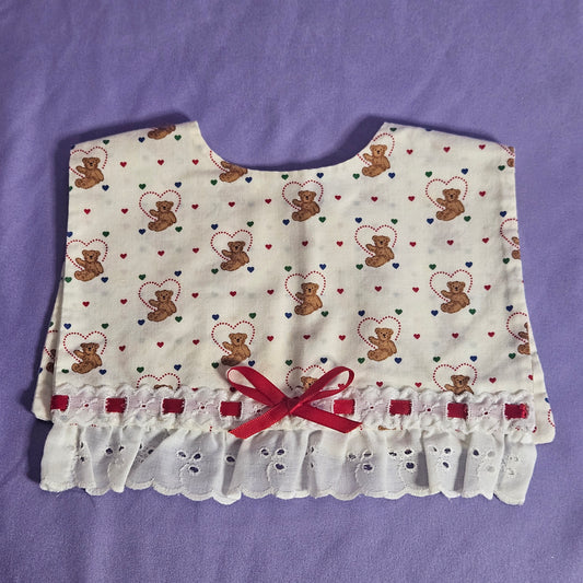 Handmade cotton bib,  teddy bear with hearts, ruffle trim and ribbon accent