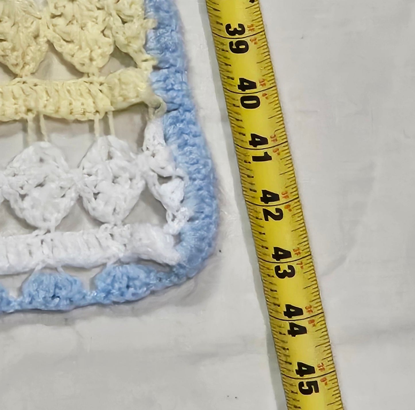 43" x 34" lacy crocheted decorative blanket in pastel colors