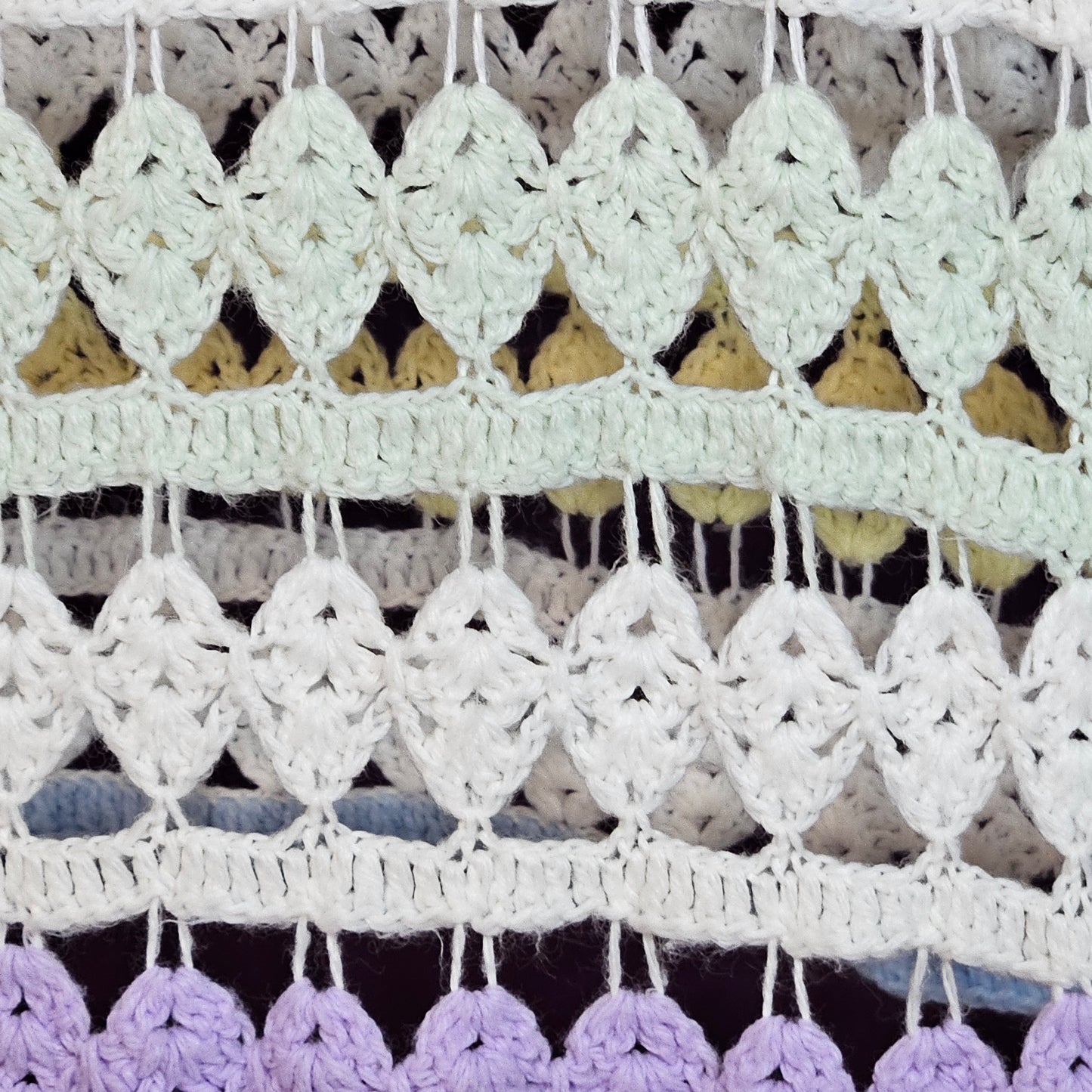 43" x 34" lacy crocheted decorative blanket in pastel colors