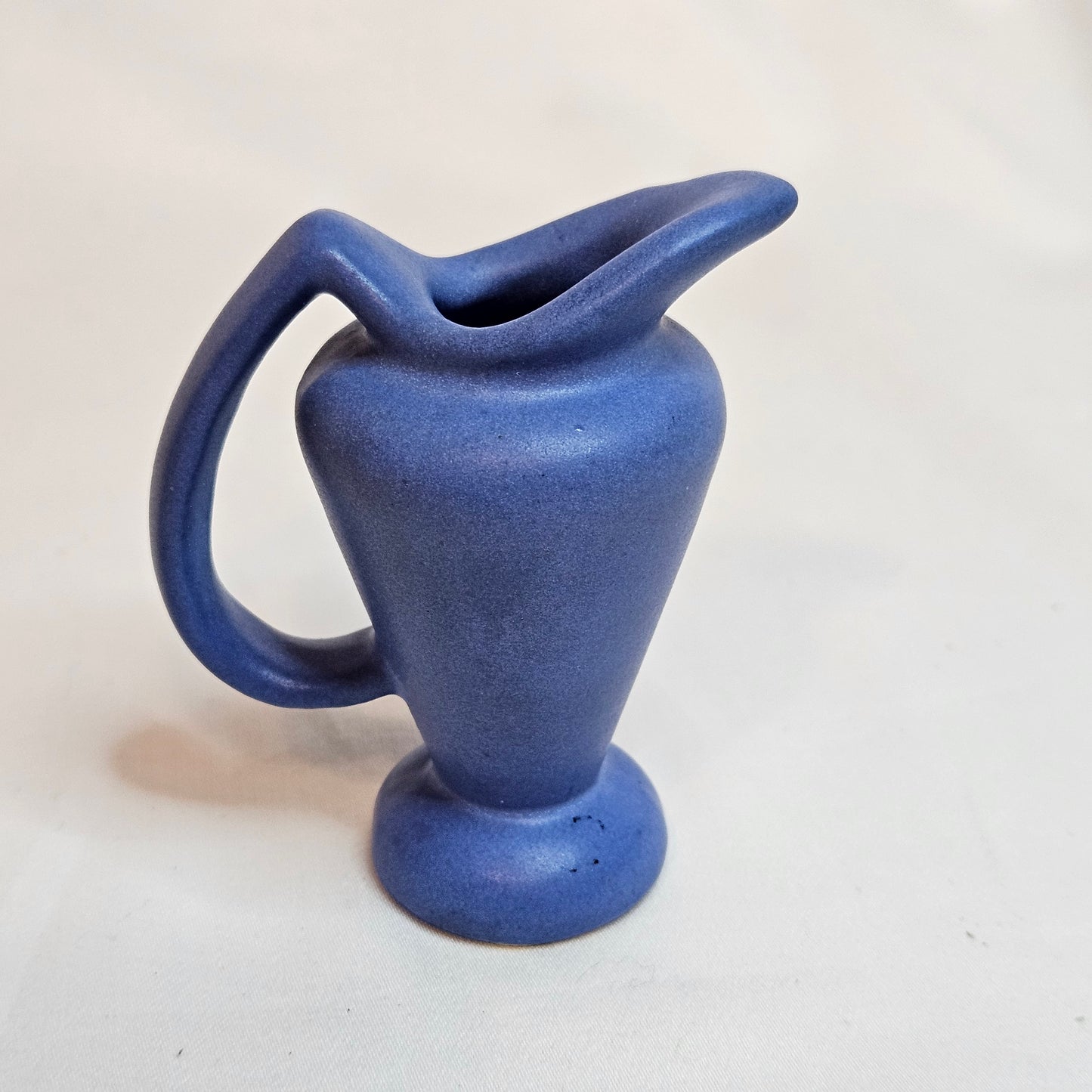 Vintage Niloak Pottery miniature pitchers, 3.25 inches tall