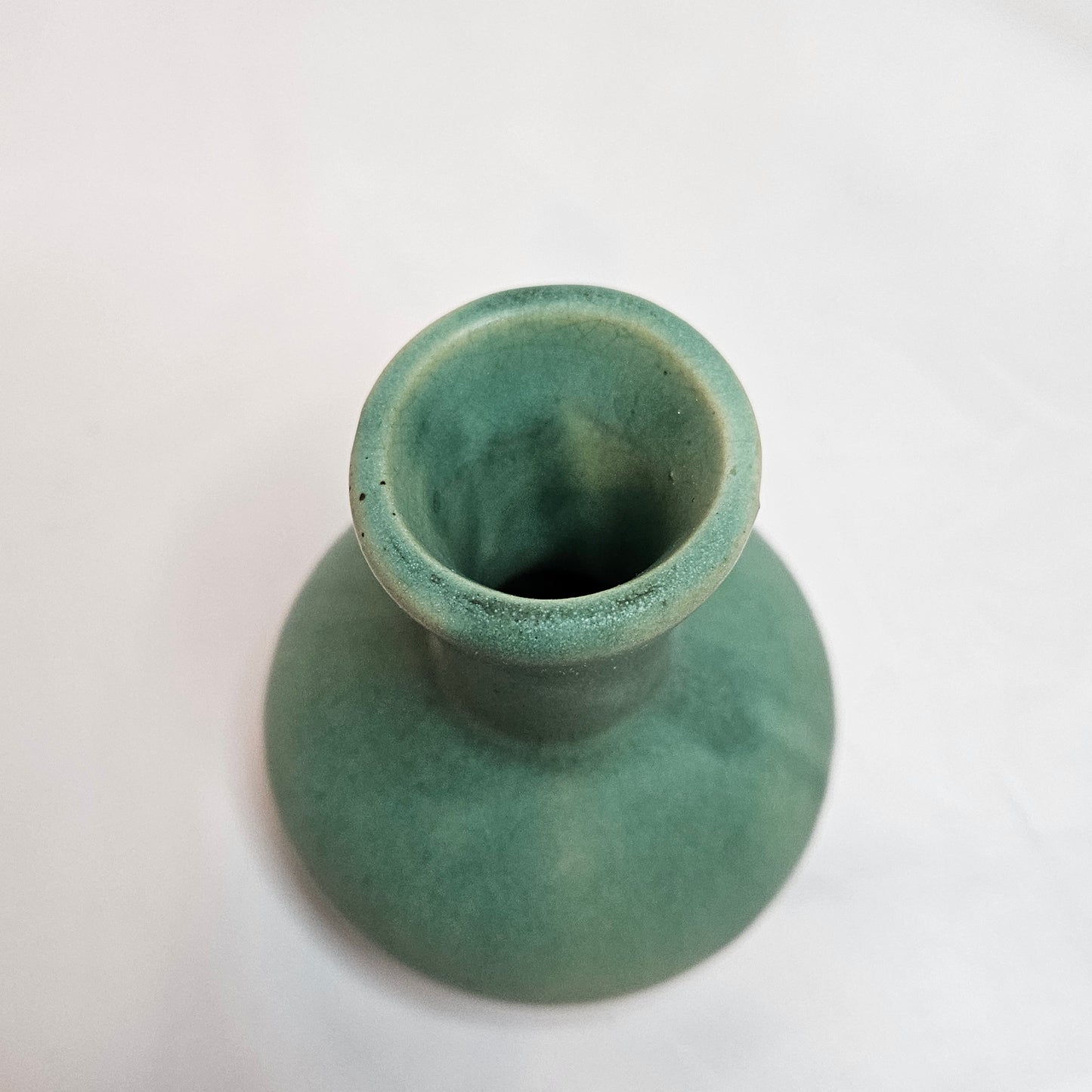 Vintage Niloak Pottery small green bud vase, 3.75 inches tall