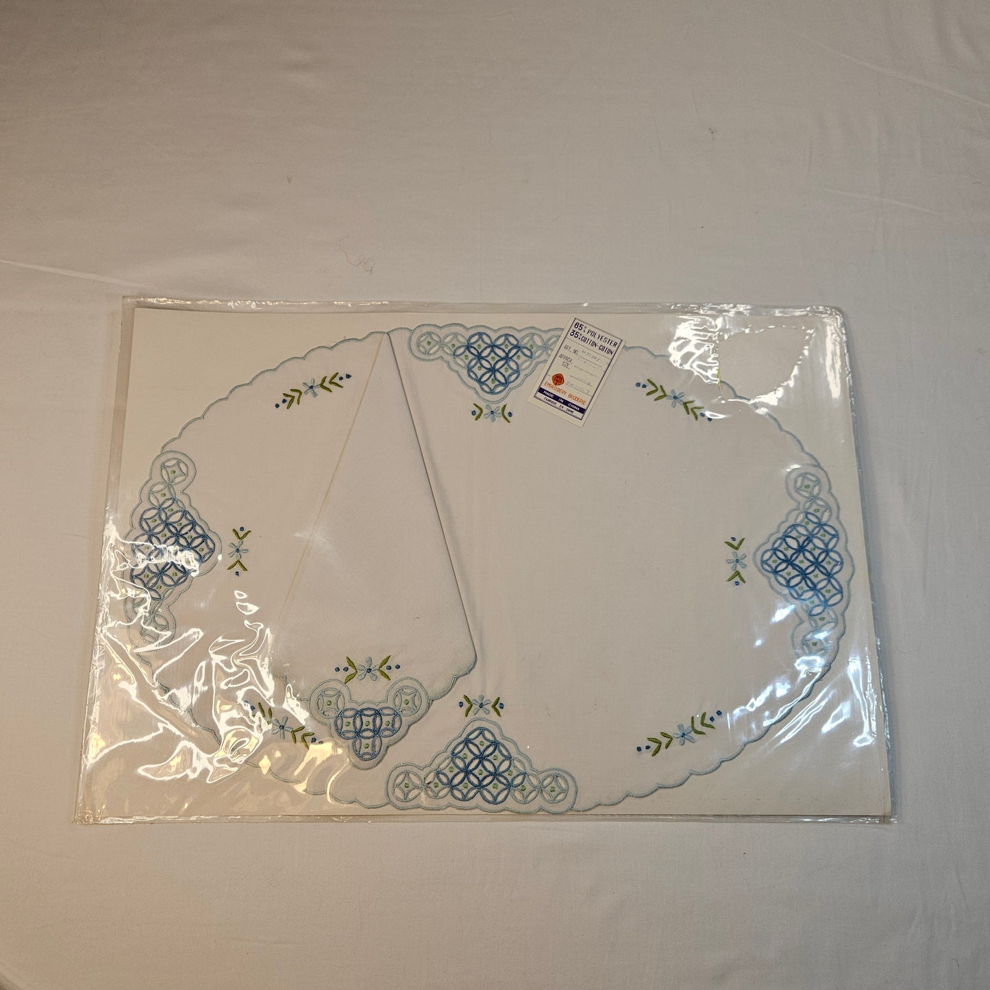 Vintage embroidered placemats and napkins, set of 8, never used