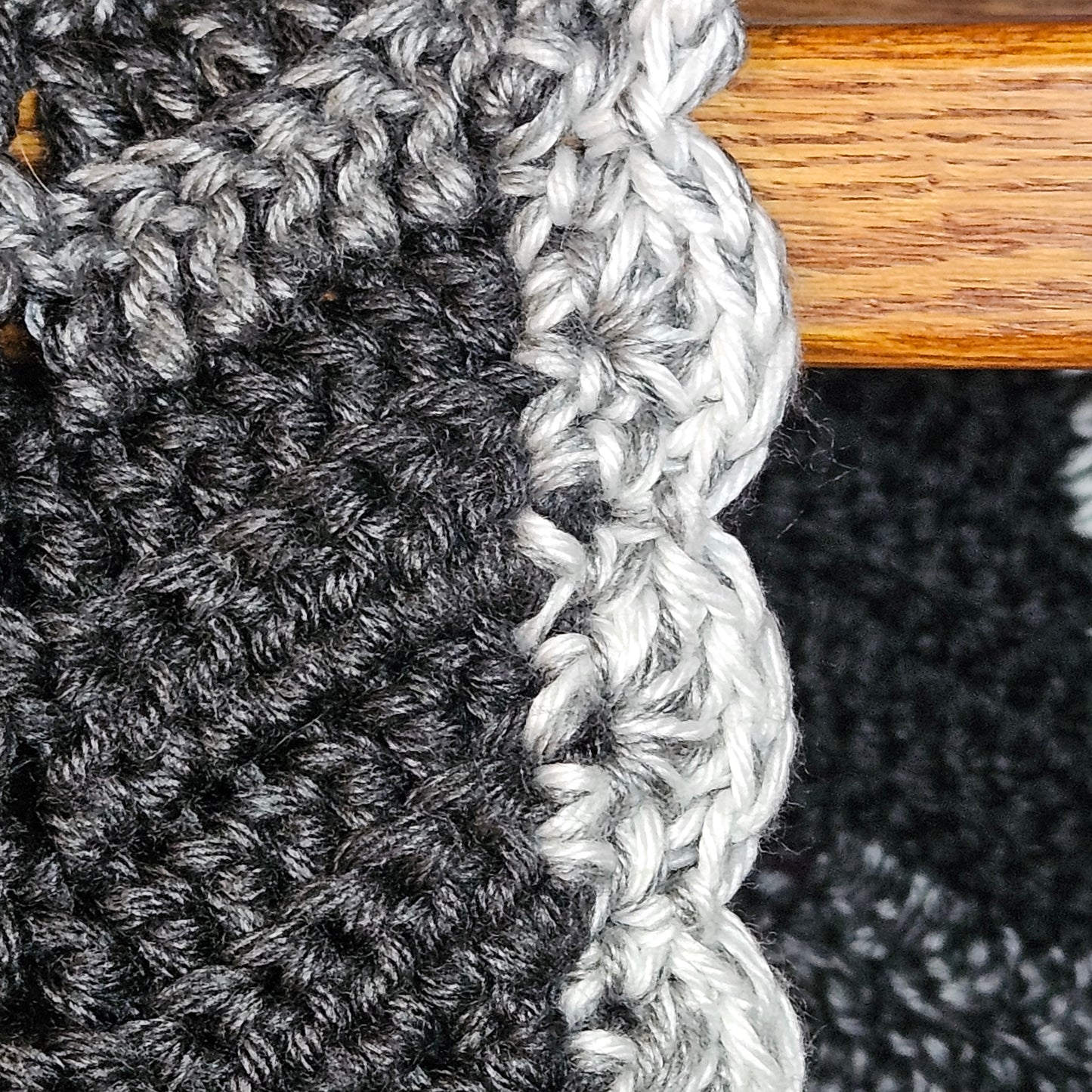 Handmade crochet heavy blanket in black, white, and grey, 45" x 39"