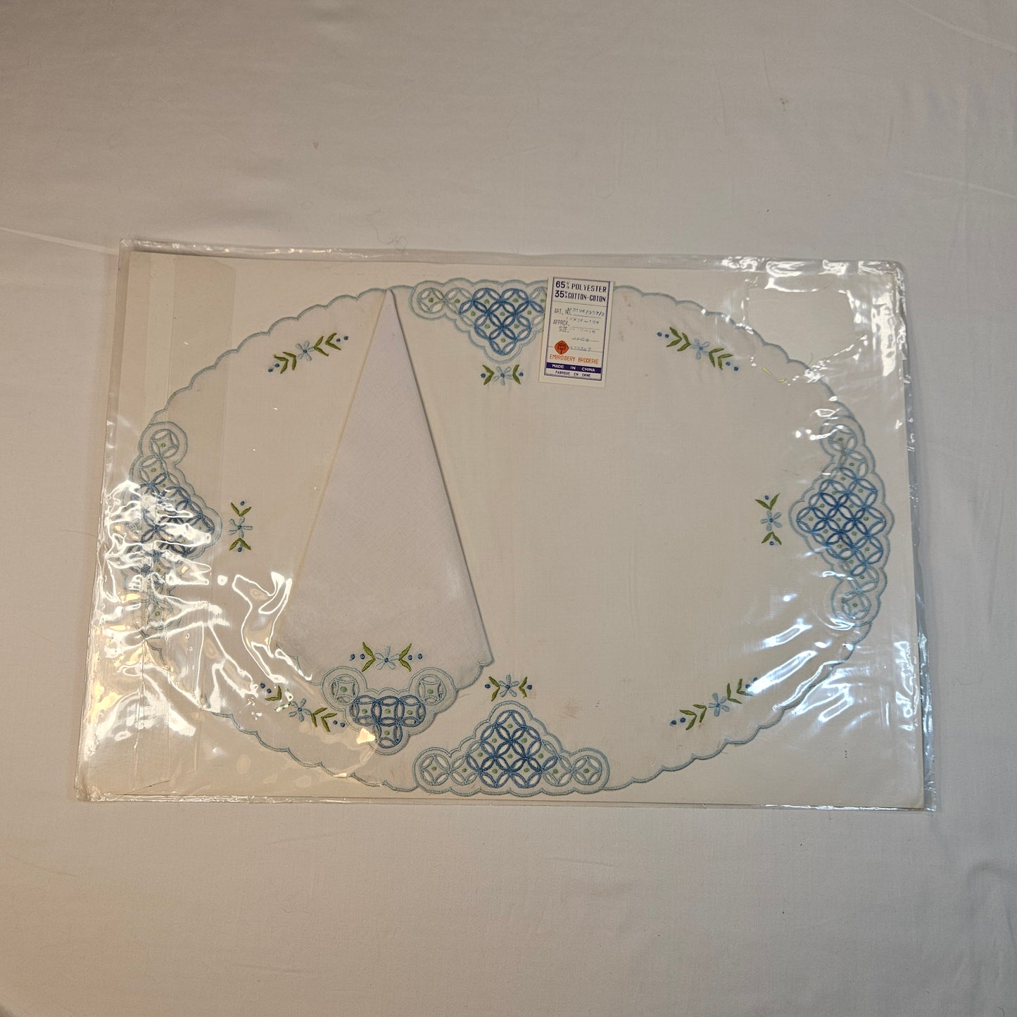 Vintage embroidered placemats and napkins, set of 8, never used